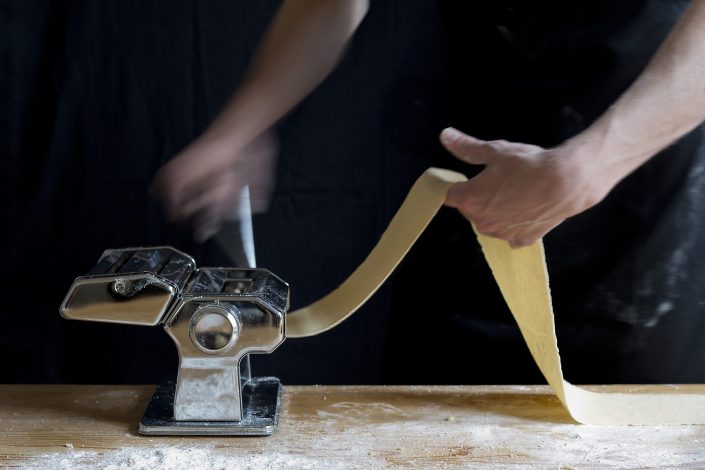 Food photography, making pasta, past machine