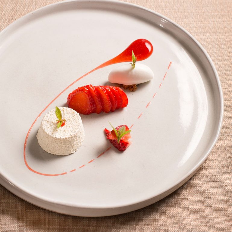 Dessert at so-lo strawberry and lemon verbena on a white plate food photographer liverpool