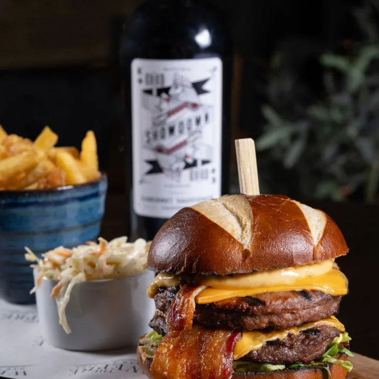 Food Photographer Liverpool Restaurant photography Liverpool Burgers chips coleslaw and wine on a board