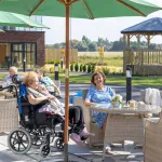 Care home residents enjoying the sun in Lytham Lancashire, Care home photographer north west UK
