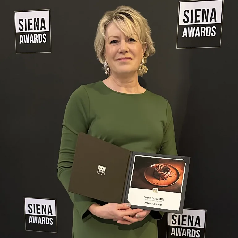 Patricia Niland award winning Photographer recieving her award at the Siena Awards Italy 2025