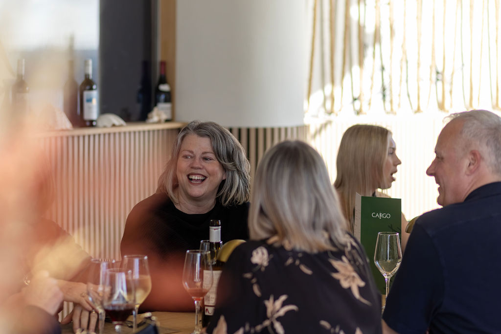 Happy diners at a restaurant in Liverpool - Liverpool hospitality photographer